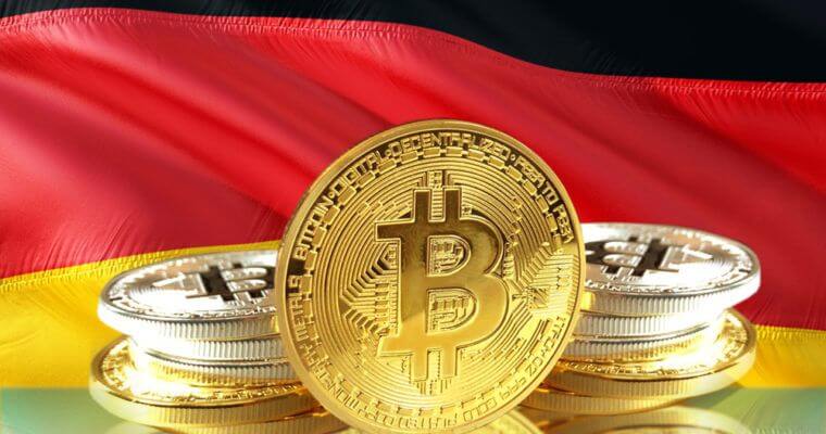 moeda de bitcoin com bandeira da alemanha ao fundo