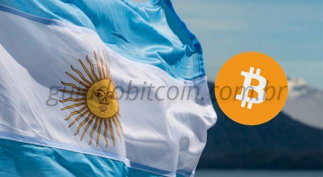 bandeira da argentina e uma moeda de bitcoin