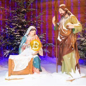presépio de natal com moeda bitcoin