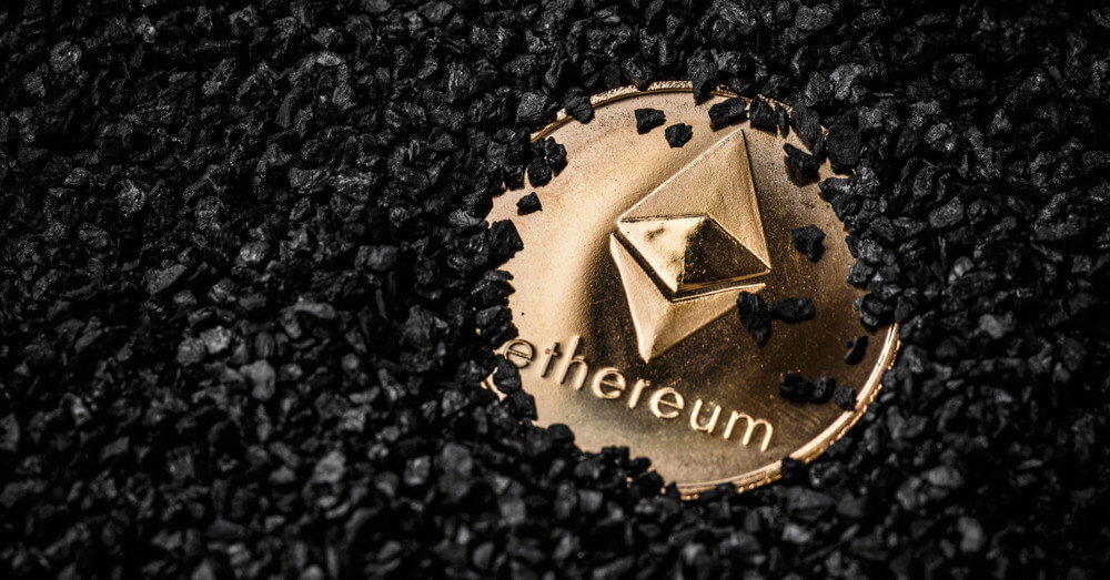 Uma imagem de uma moeda Ethereum coberta com pedrinhas pretas