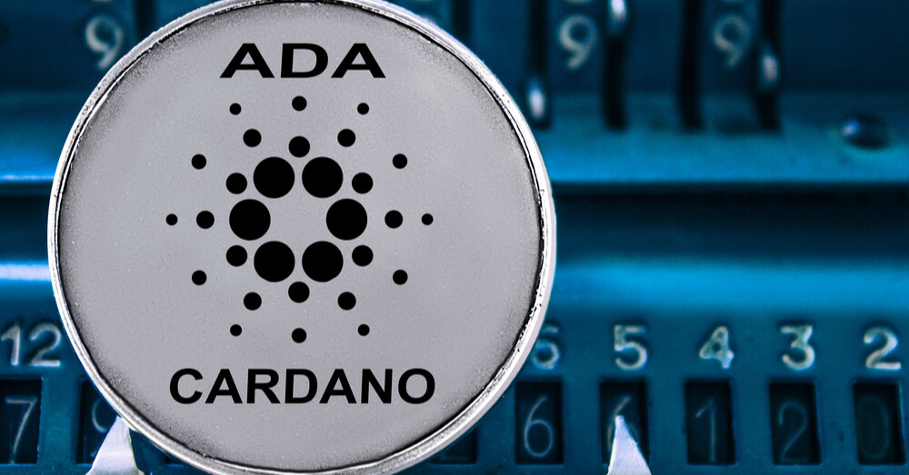 Moeda Cardano com máquina de somar números