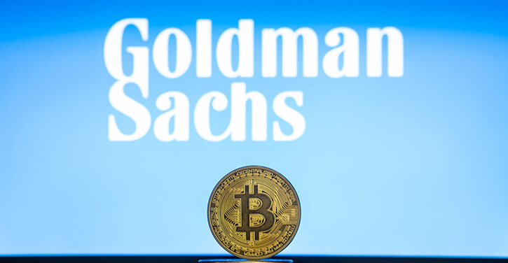 Logotipo da Goldman Sachs e Bitcoin