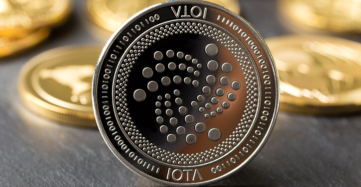 Versão física do IOTA na frente de outras moedas